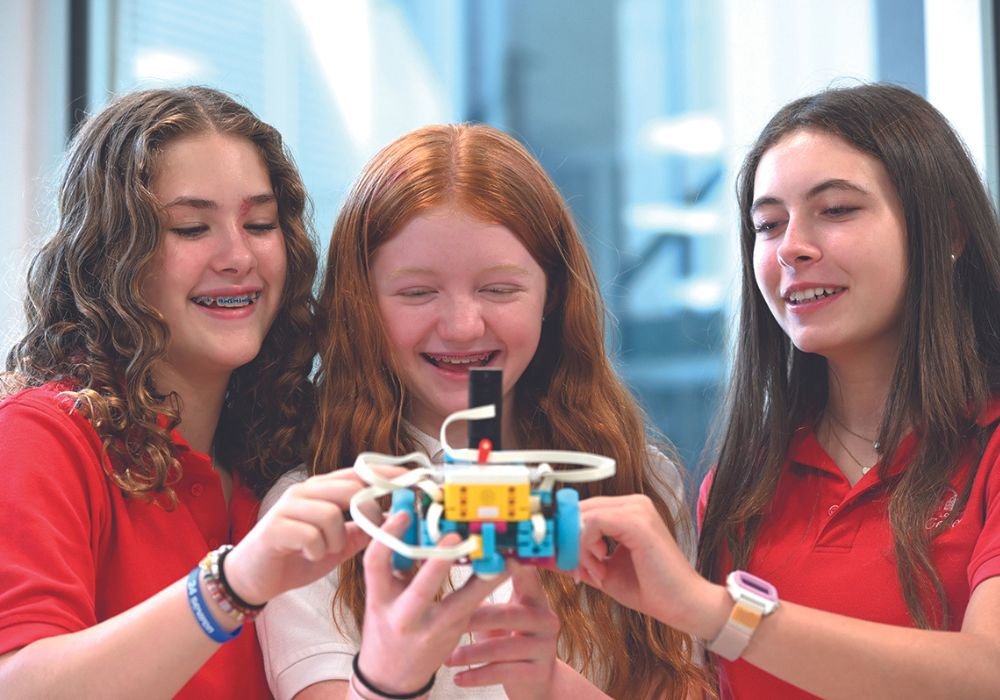 middle school girls with robotics